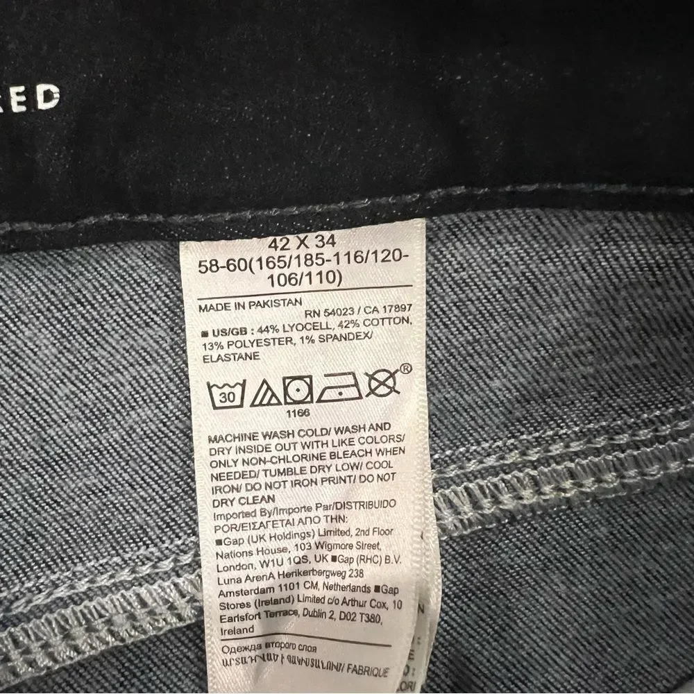 NWOT Banana Republic Men's traveler jeans taper fit size 42x34 dark wash